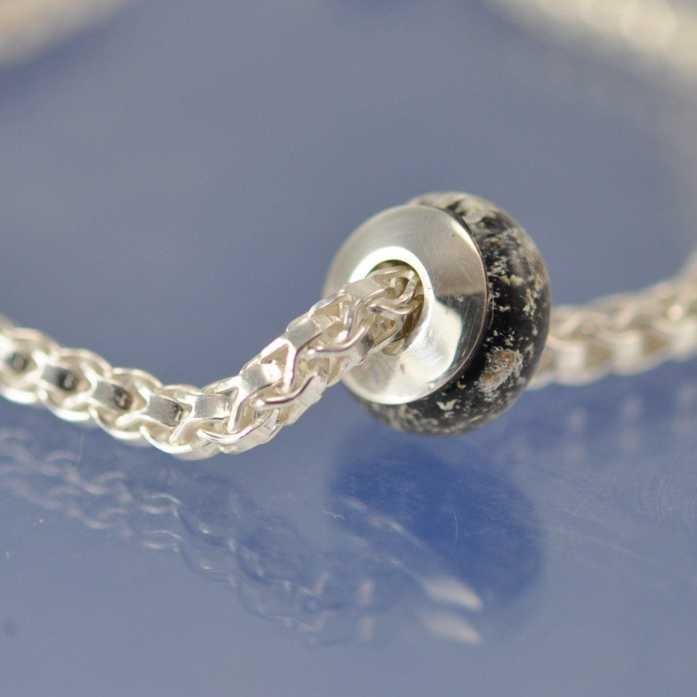 Cremation Ashes Into Glass Bead ON  a Dovetail 4mm Bracelet Bead by Chris Parry Jewellery