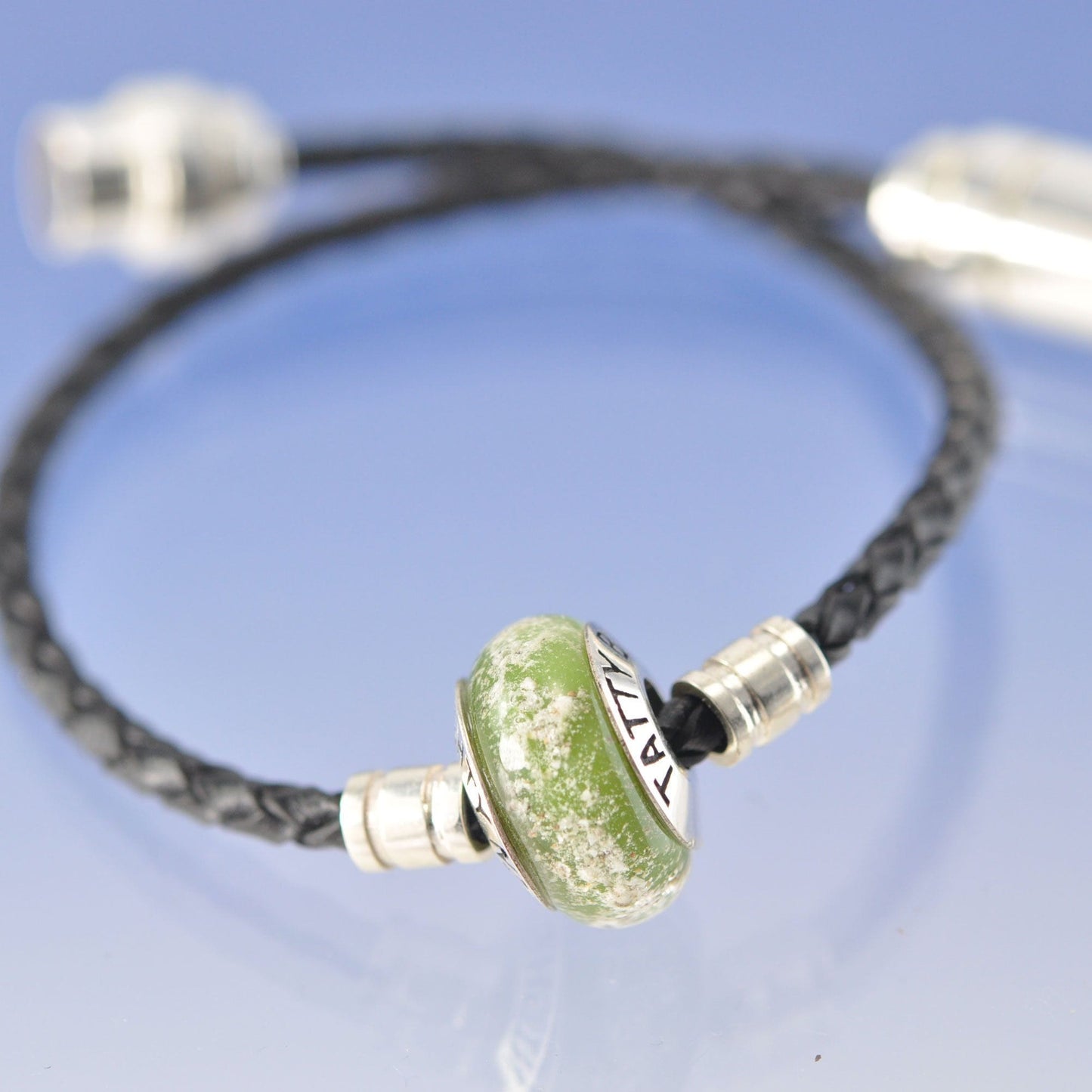 Cremation Ashes Into Glass Bead ON leather bracelet. Bead by Chris Parry Jewellery