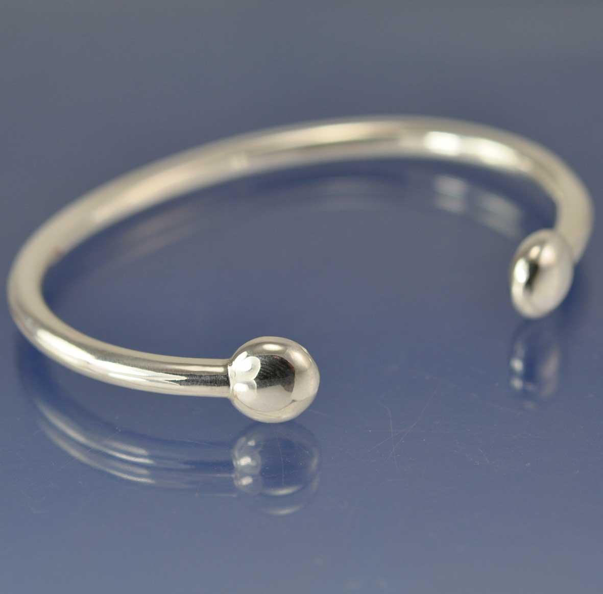 Sterling silver cuff store bracelet with ball ends