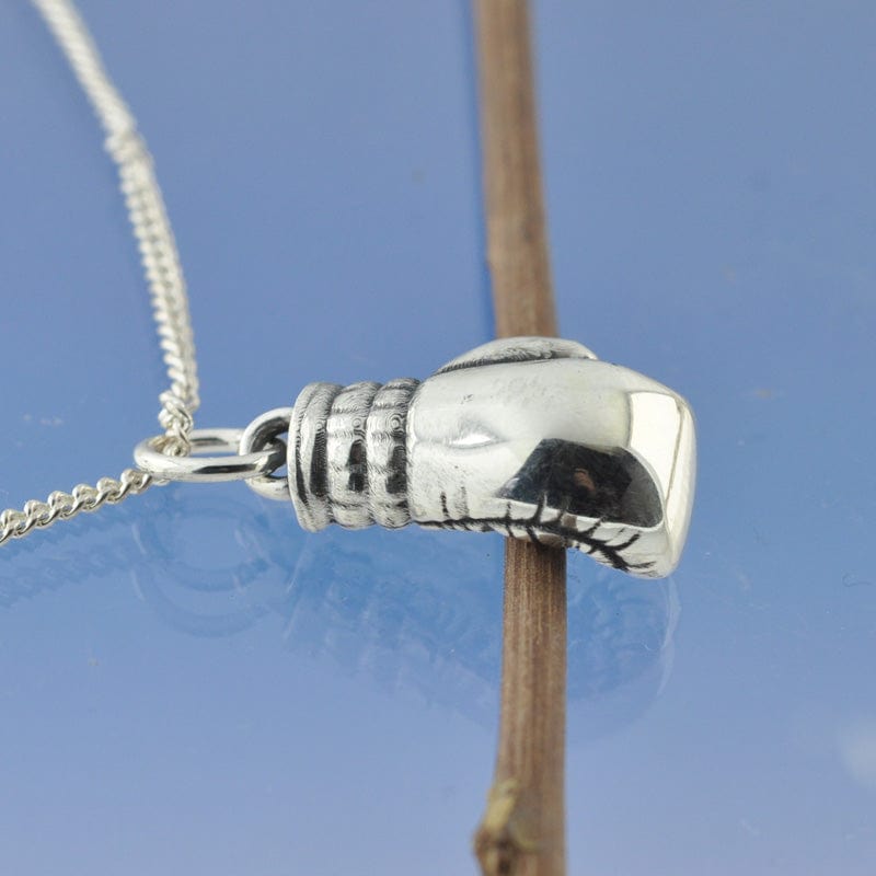 Boxing glove cremation jewelry store