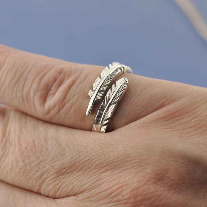 Wrapping Angel Feather Ring with Cremation Ashes Ring by Chris Parry Jewellery